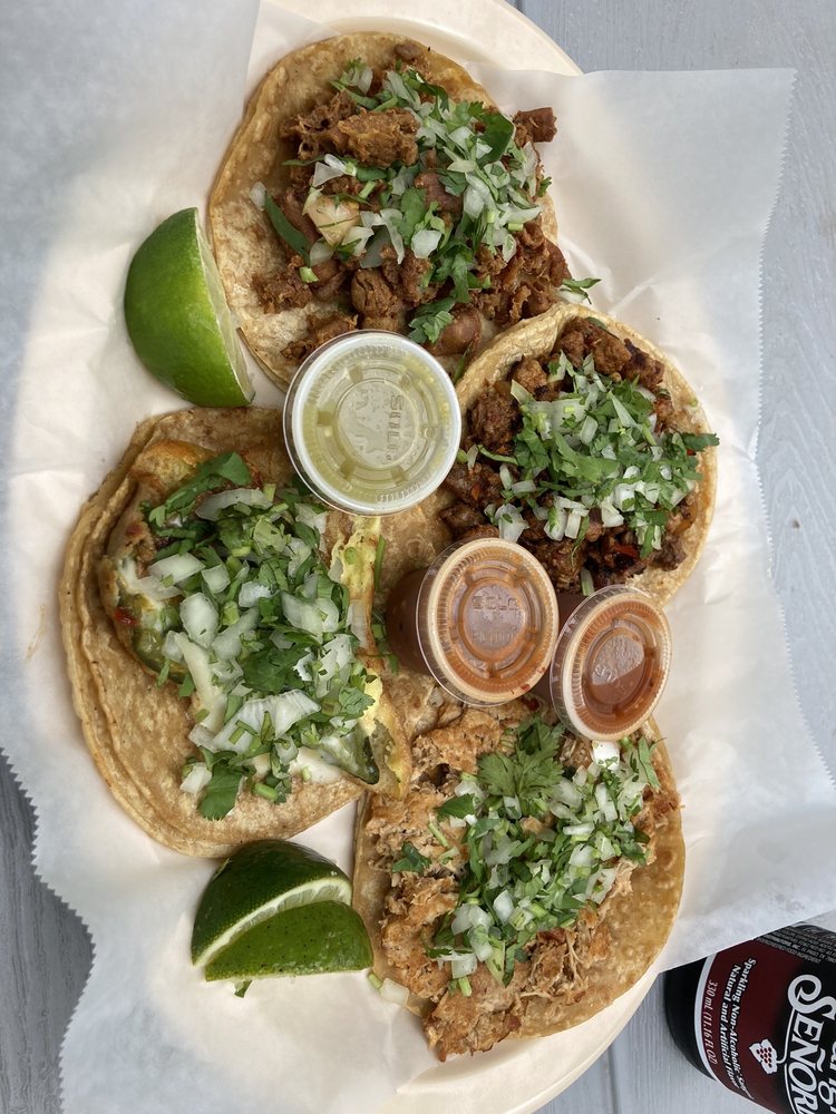 Street tacos with cilantro, onion, lime and house salsas